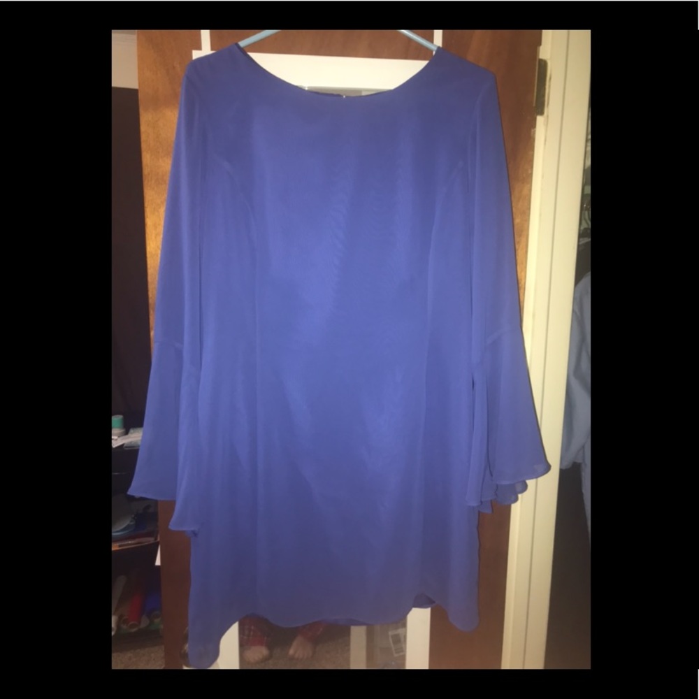 Thigh length cocktail dress.